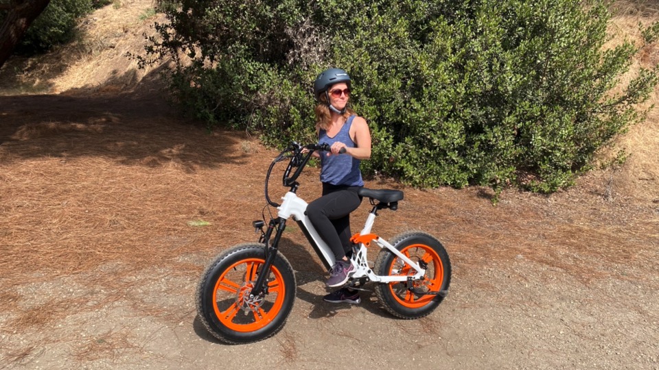 Woman on the Corgi 2 e-bike