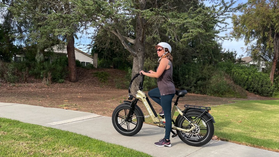 Short woman on electric bike