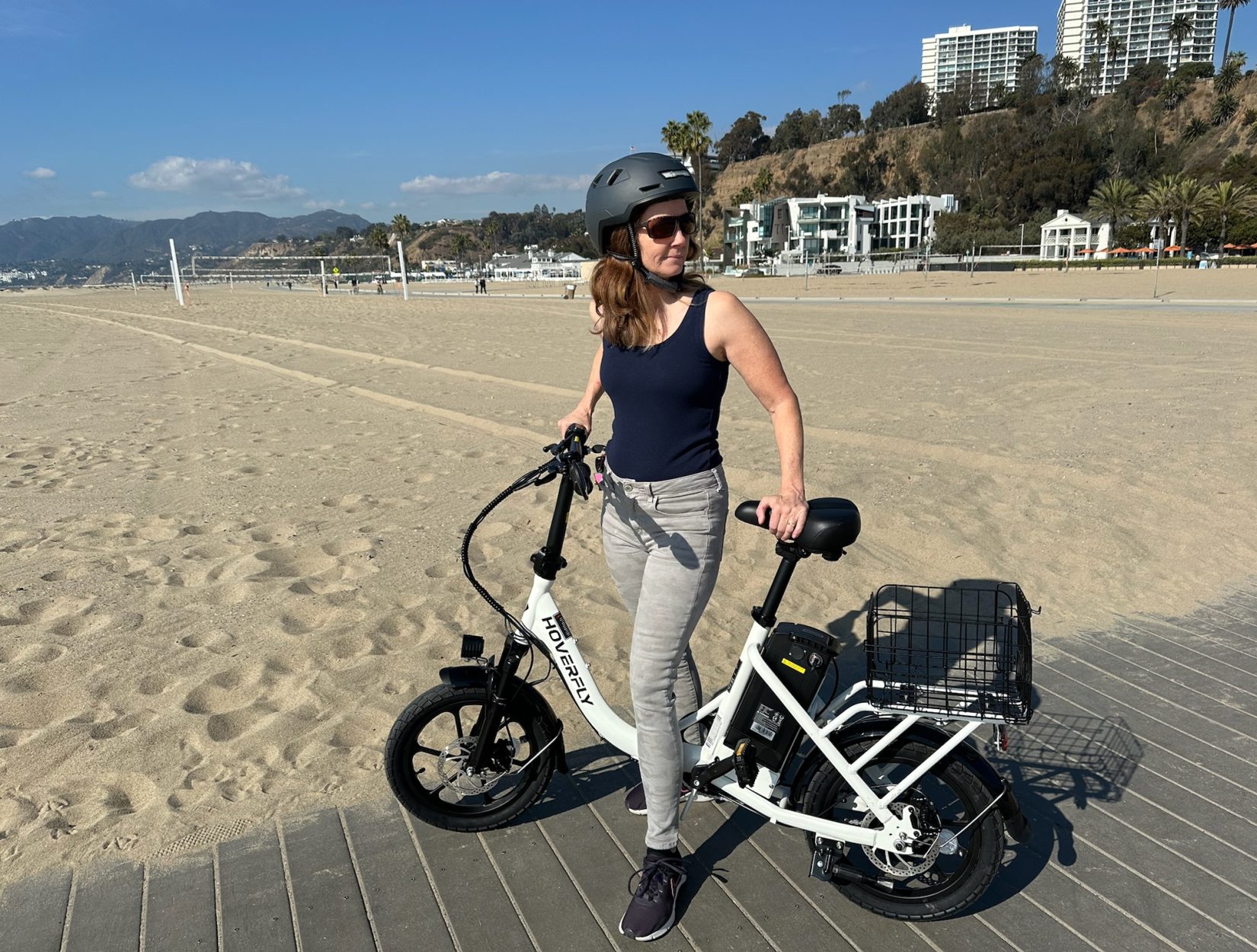 woman riding Hoverfly Folding E-bike