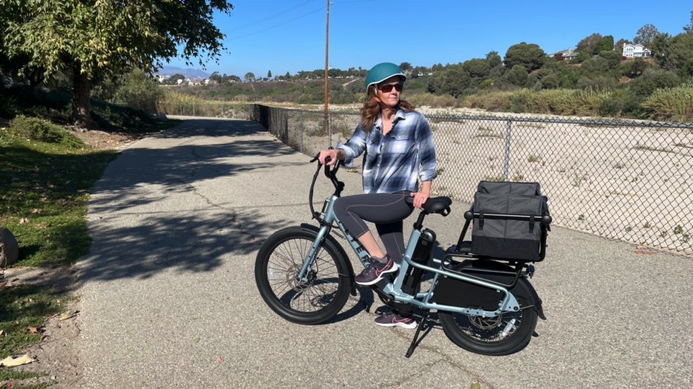 woman on Radio Flyer Flex Electric Cargo Bike